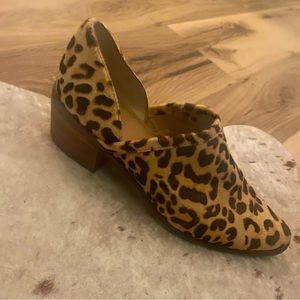 Leopard print genuine calf hair mules.
